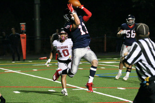Senior Nolan OBrien catches a pass in his record-setting season. Photo courtesy of Sophie Ward.